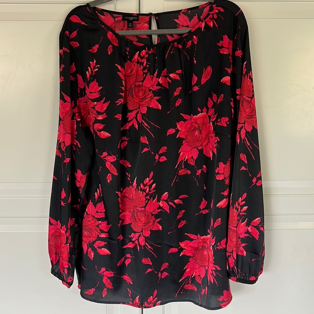 New, no tags, beautiful silky feel blouse.